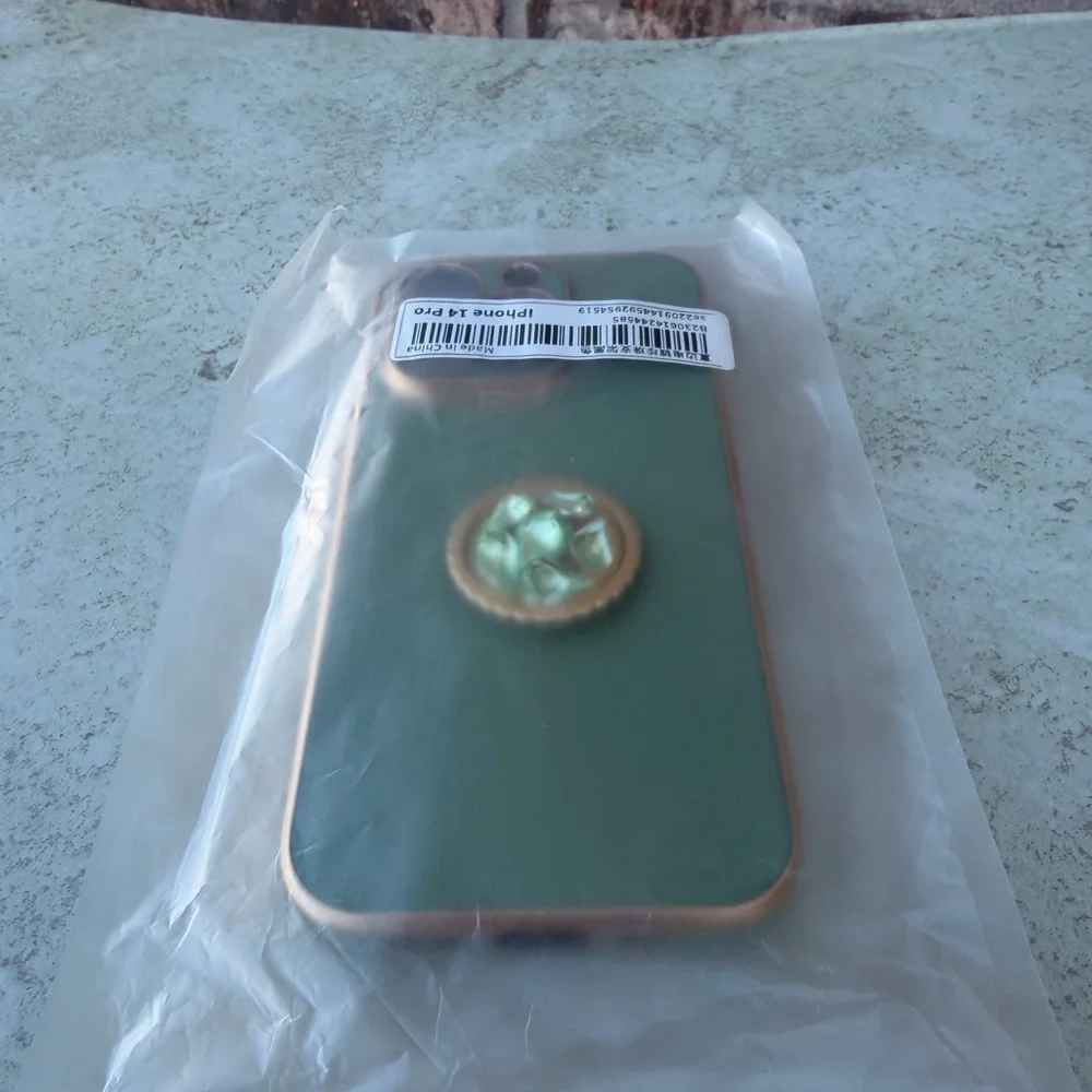 Green iPhone 14 Pro Case with Gold Accents